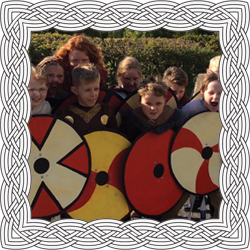 Children using Viking shields