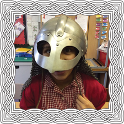 School girl wearing Viking helmet